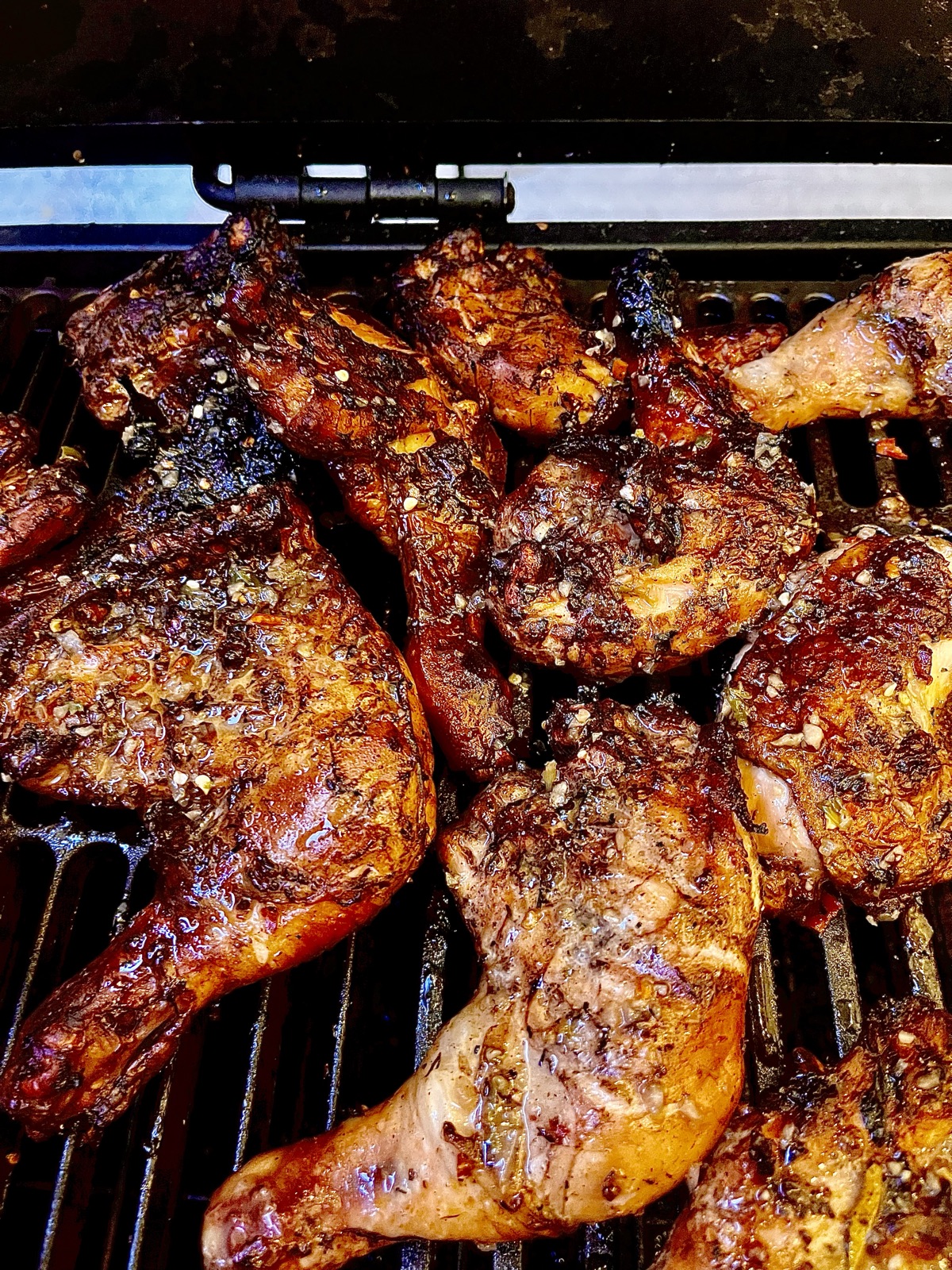 Grill plate with jerk chicken, corn and macaroni pie